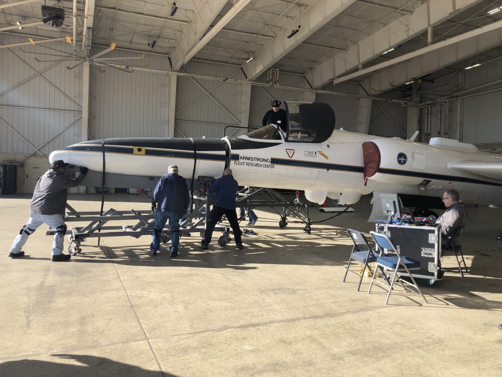 NASA ground crew preparing the ER-2 for a science flight at Hunter Army Airfield in Savannah, Georgia. There are seven scientific instruments located on the aircraft for the IMPACTS project and they are used to study snowstorms. Credit: NASA/Katie Stern