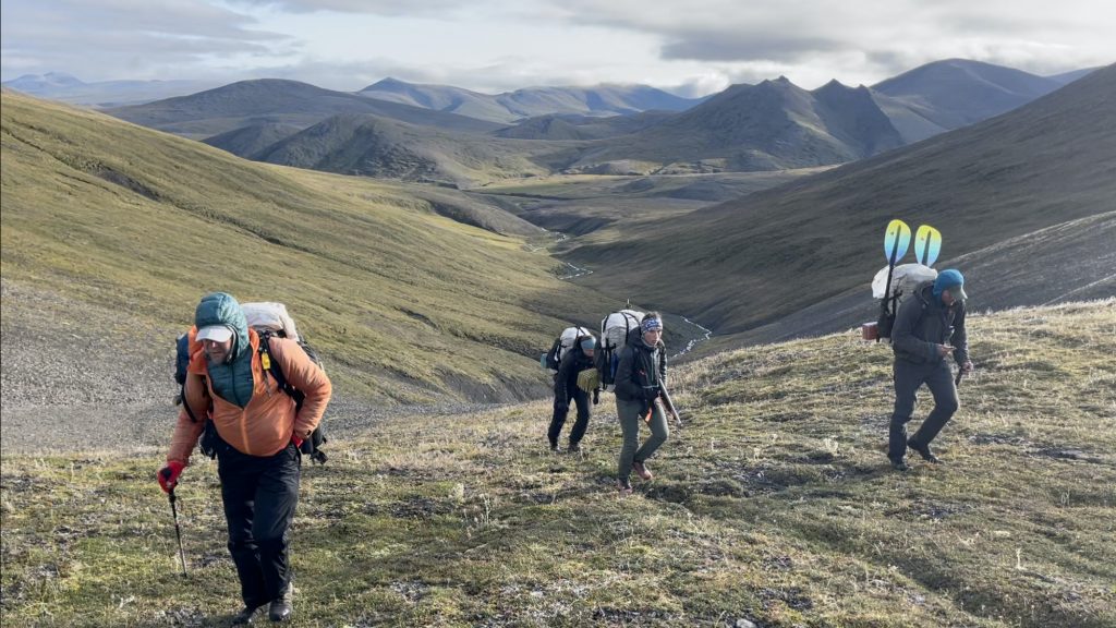 To better understand impacts of climate change on vegetation in the Alaskan Arctic, a group of researchers are linking long-term NASA satellite observations with ecological field data collected while trekking through the Brooks Range in northern Alaska. Photo by Roman Dial.