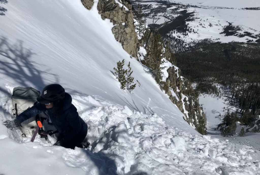 abrielle Antonioli assessing the snow atop the Elevator Shaft ski line in the Sawtooth mountains of Idaho.