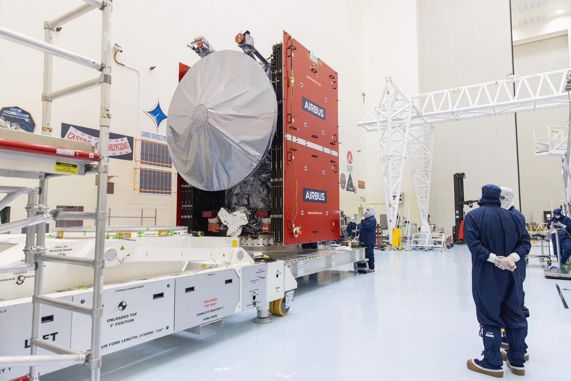 Technicians work to complete operations before propellant load occurs ahead of launch for NASA’s Europa Clipper spacecraft inside the Payload Hazardous Servicing Facility at the agency’s Kennedy Space Center in Florida on Tuesday, Sept. 11, 2024. Europa could have all the “ingredients” for life as we know it: water, organics, chemical energy, and stability. Europa Clipper’s launch period opens on October 10, 2024.