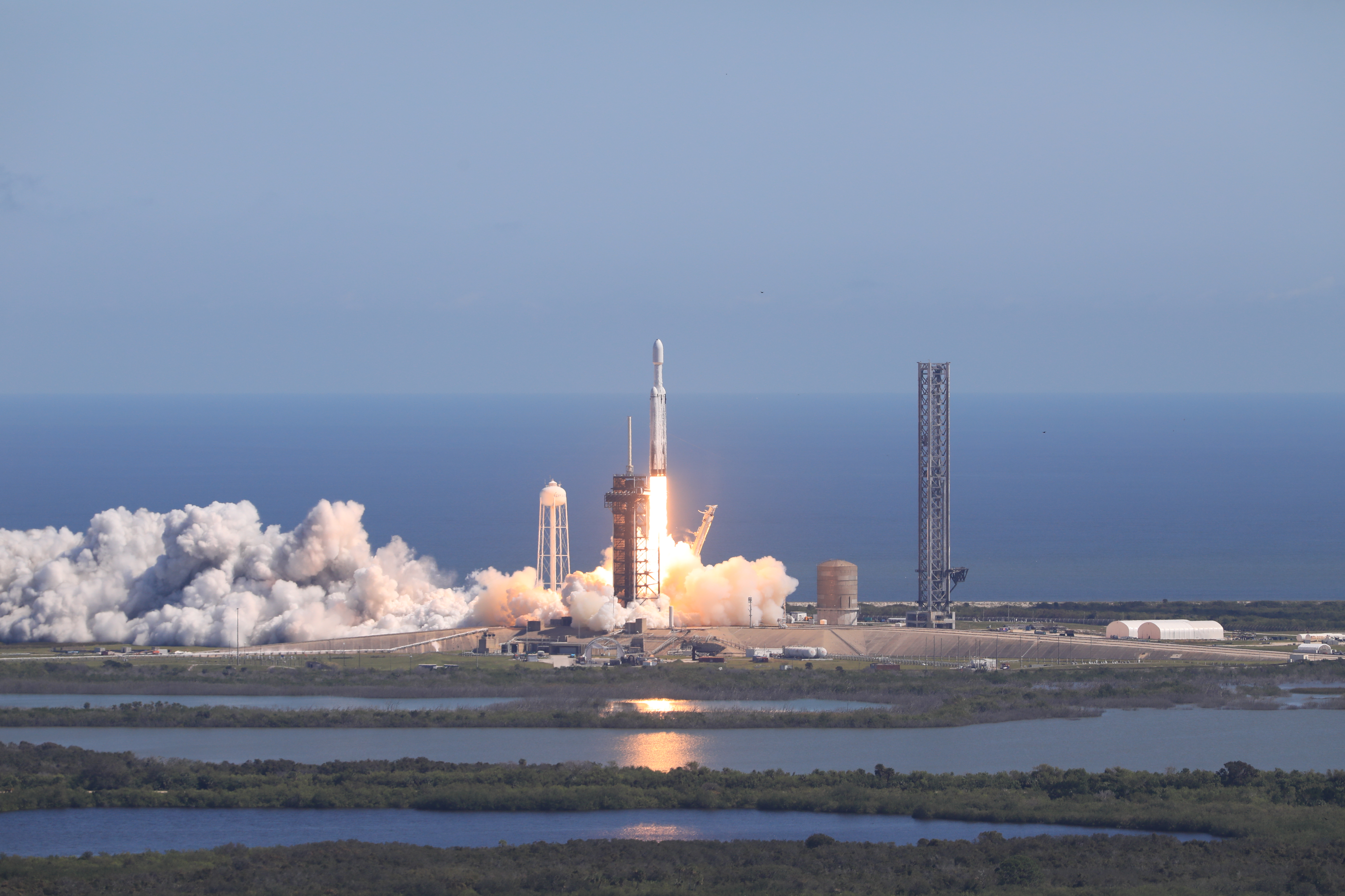 A SpaceX Falcon Heavy rocket carrying NASA’s Europa Clipper spacecraft lifts off from Launch Complex 39A at NASA’s Kennedy Space Center in Florida at 12:06 p.m. EDT on Monday, Oct. 14, 2024. After launch, the spacecraft plans to fly by Mars in February 2025, then back by Earth in December 2026, using the gravity of each planet to increase its momentum. With help of these “gravity assists,” Europa Clipper will achieve the velocity needed to reach Jupiter in April 2030