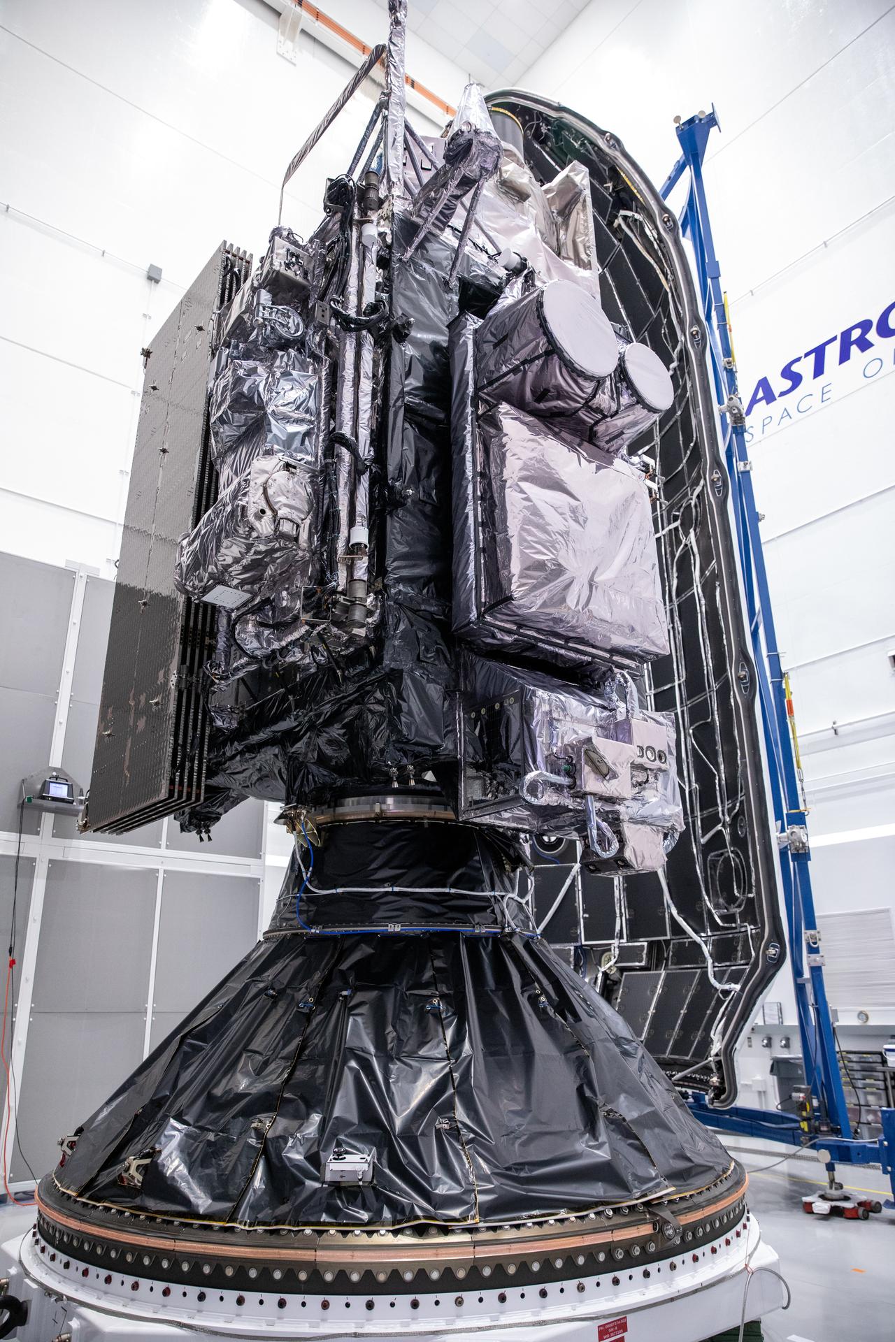 Technicians at the Astrotech Space Operations facility near NASA’s Kennedy Space Center in Florida connect NOAA’s (National Oceanic and Atmospheric Administration) Geostationary Operational Environmental Satellite (GOES-U) to the payload adapter on Thursday, June 13, 2024, in preparation for its upcoming launch. 