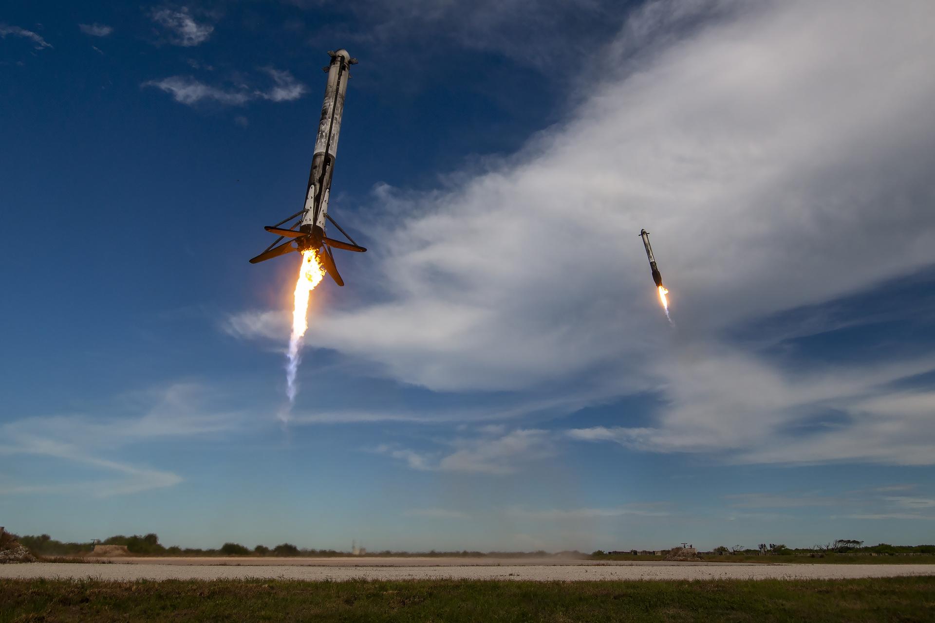 Side boosters from SpaceX's Falcon Heavy rocket land at Cape Canaveral Space Force Station on Tuesday, June 25, 2024.