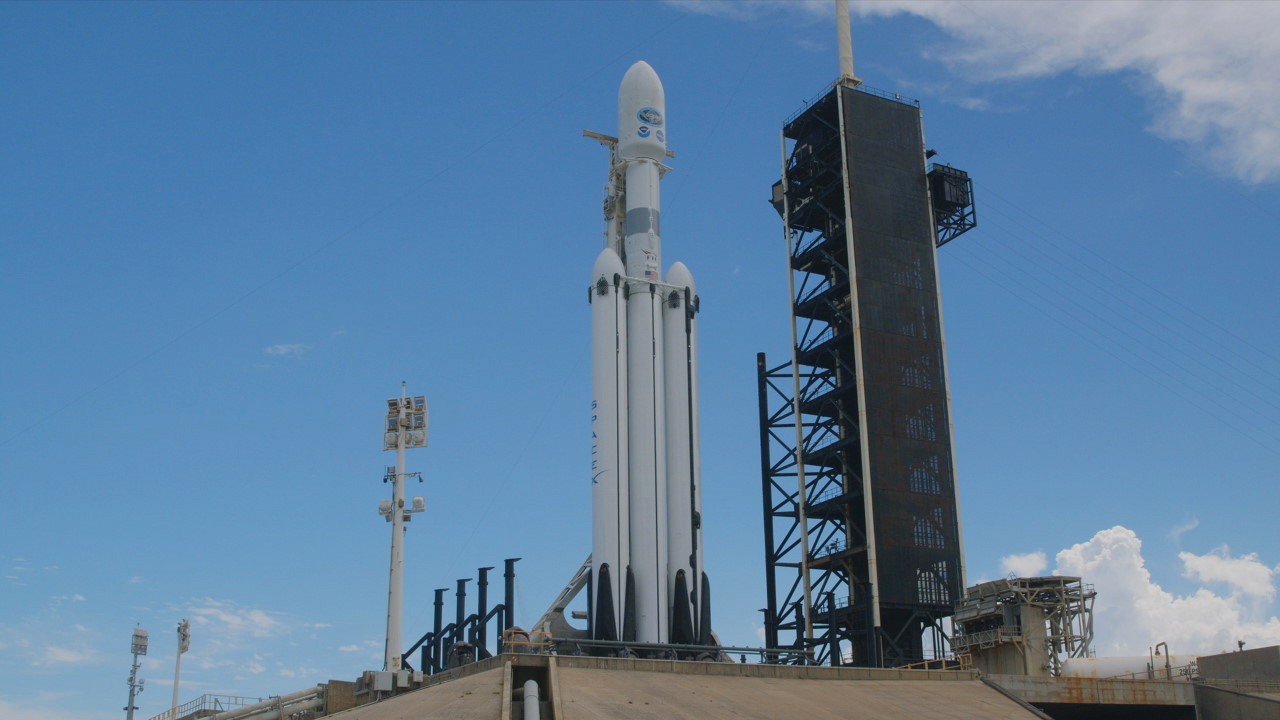 A SpaceX Falcon Heavy rocket carrying the National Oceanic and Atmospheric Administration (NOAA) GOES-U (Geostationary Operational Environmental Satellite U) stands vertical at Launch Complex 39A at NASA’s Kennedy Space Center in Florida on Tuesday, June 25, 2024.