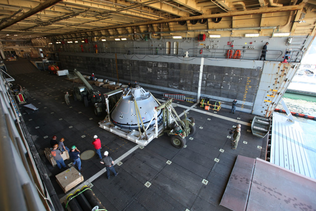 The test version of the Orion crew module was transported into the well deck of the USS San Diego at Naval Base San Diego in California on Oct. 21 to prepare for Underway Recovery Test 5. 