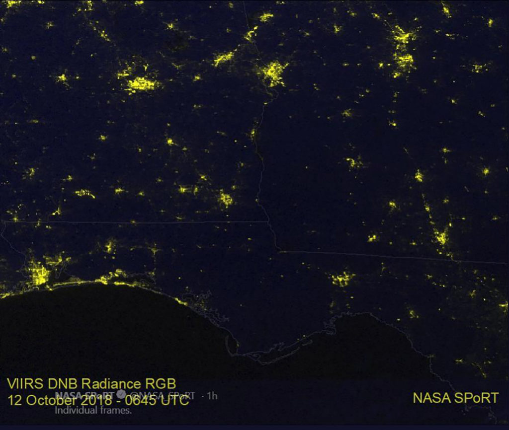 An area of the U.S. shows a swath of darkness after Hurricane Michael made landfall.