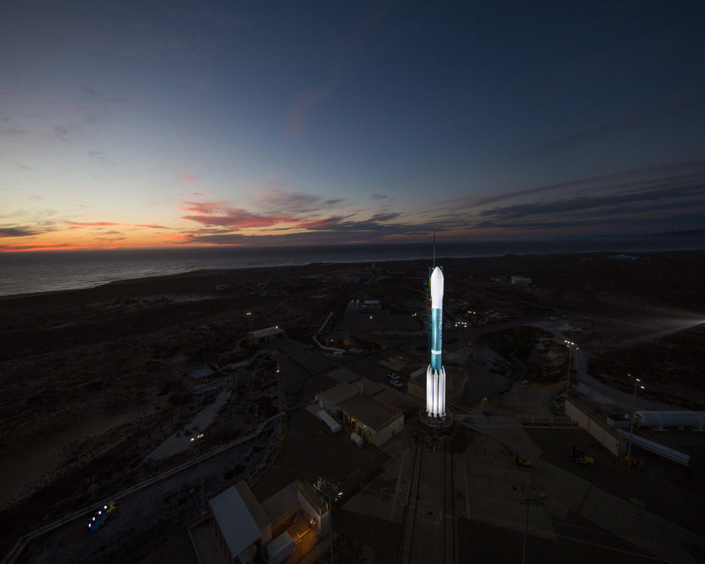 A ULA Delta II rocket carrying NOAA's JPSS-1 spacecraft stands poised for launch.