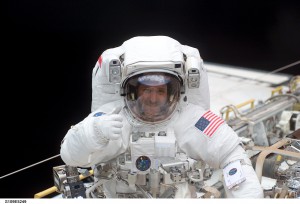 In this image from March 2002, John M. Grunsfeld is shown in space shuttle Columbia's cargo bay.