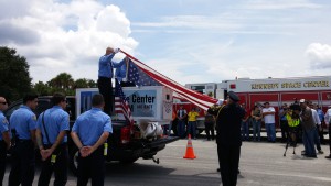 Flag removed from container carrying World Trade Center I-beam.