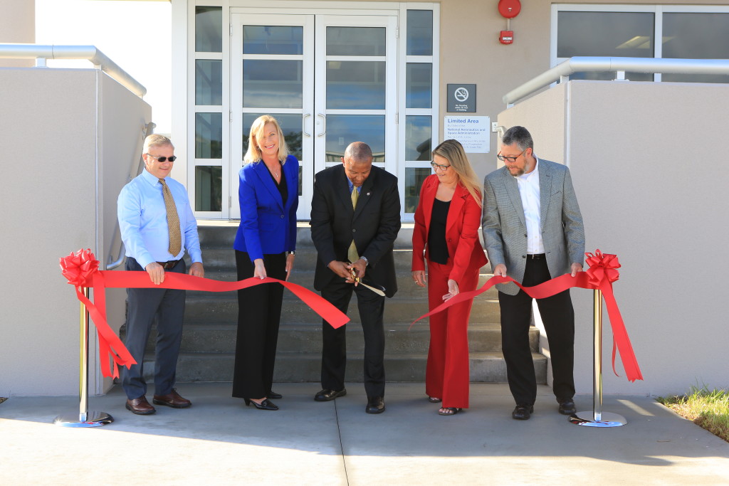 Participating in the Kennedy Data Center ribbon-cutting are, from left, Ronnie Jones, Vice President of Operations, Sauer Incorporated; Nancy Bray, Director, Spaceport Integration and Services; Kelvin Manning, Associate Director of KSC; Vanessa Stromer, Director, IT and Communication Services; and Steve Belflower, Vice President, HuntonBrady Architects