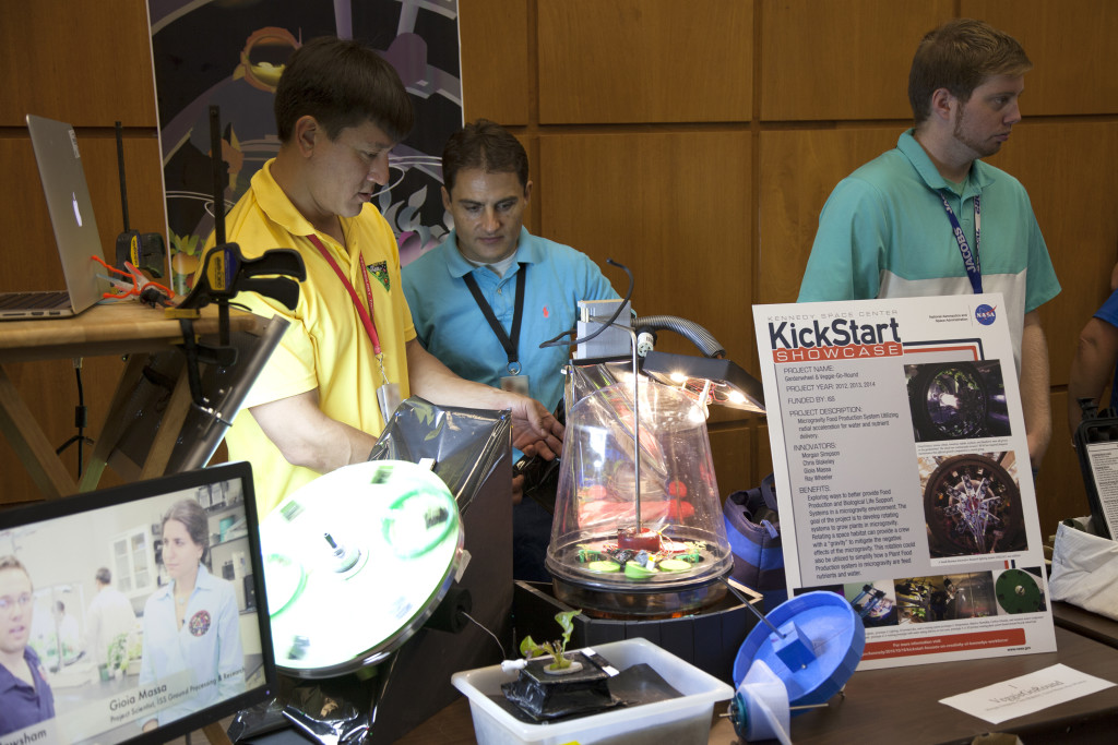 NASA scientists and engineers demonstrate concepts for inducing artificial gravity on plant growth experiments.