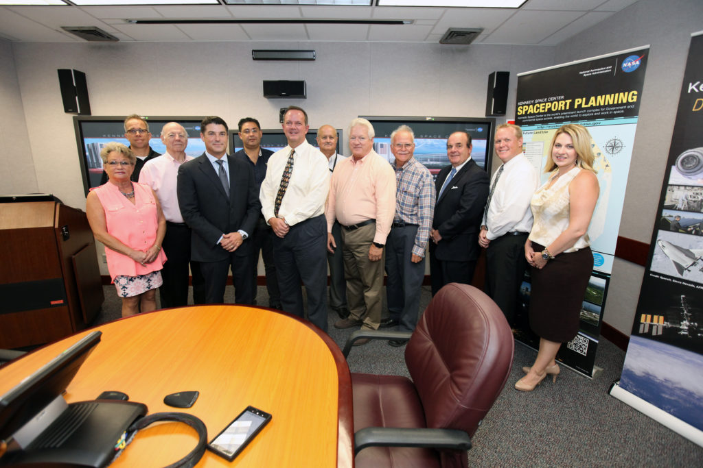 CPD Roundtable in Headquarters: Personnel composed of government representatives, discussing KSC land use for commerical space customers.