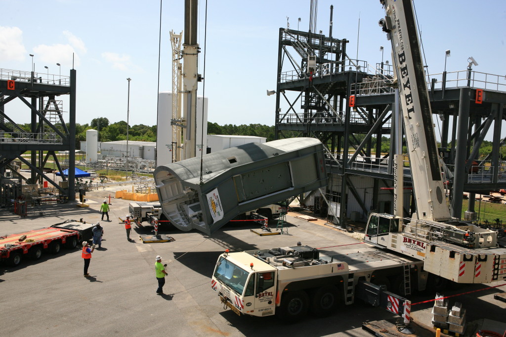 The first Tail Service Mast Umbilical arrives at Kennedy Space Center for Testing.