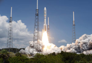 NASA's Juno planetary probe, enclosed in its payload fairing, launches atop a United Launch Alliance Atlas V rocket.