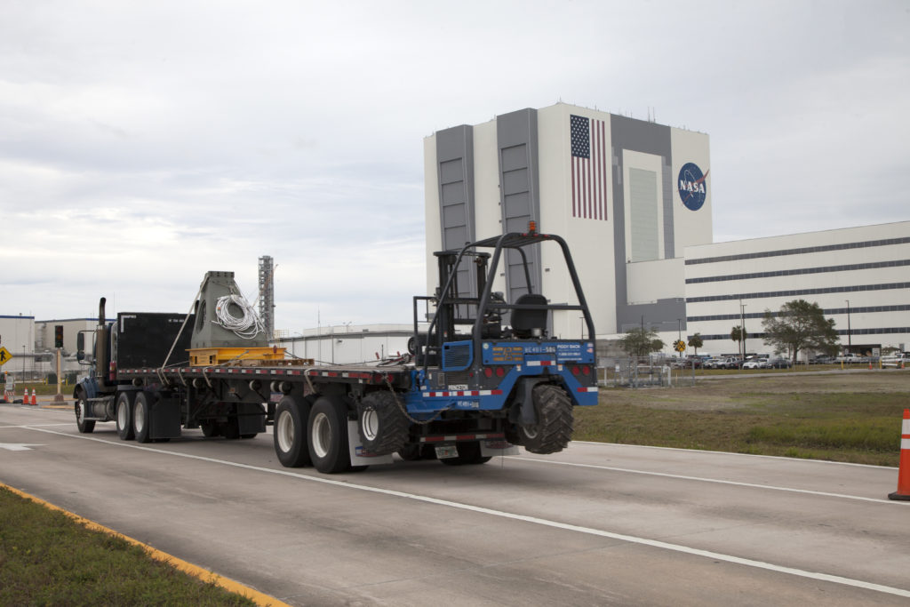 A vehicle support post is moved to the Mobile Launcher Yard at Kennedy Space Center in Florida.