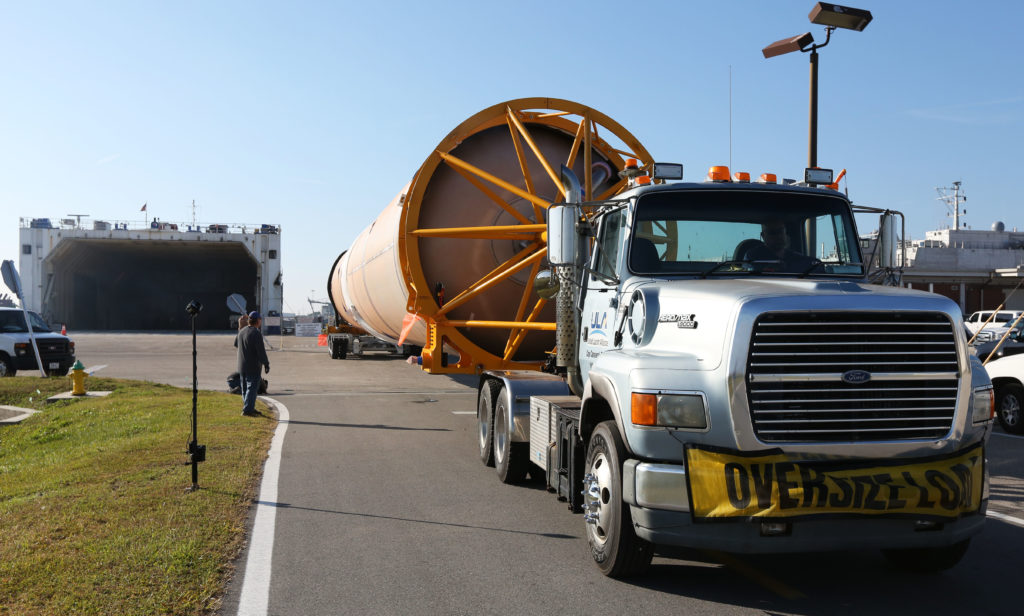 OA-7 Atlas V Booster arrives at the Army Wharf, is offloaded and transfered to the ASOC.