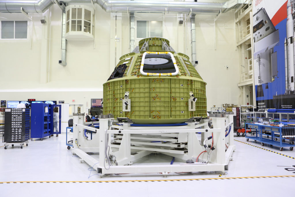 Orion spacecraft in the Neil Armstrong Operations and Checkout Building at Kennedy Space Center.