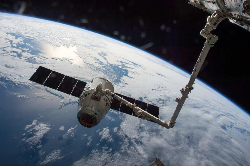 Dragon spacecraft captured by International Space Station arm