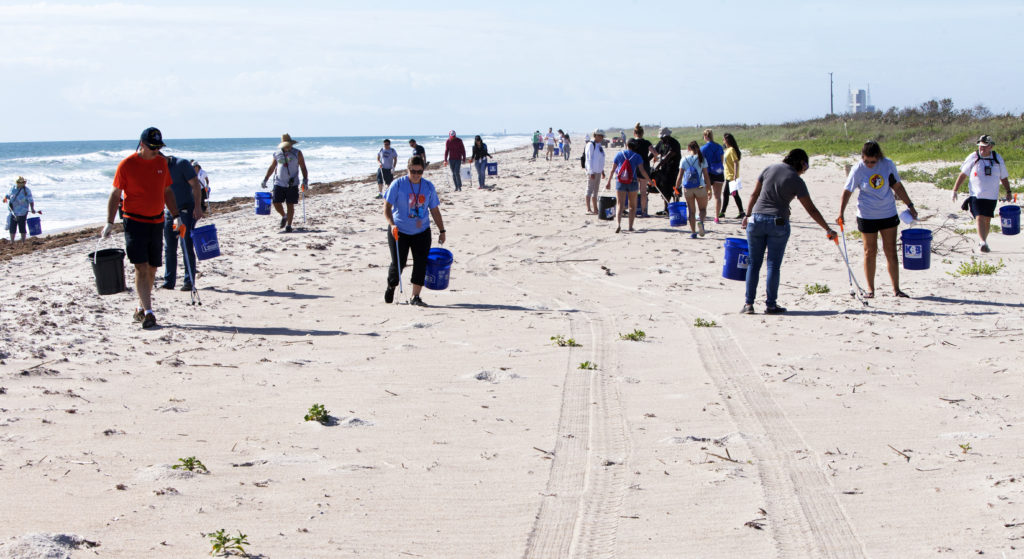 About 50 participants led by NASA Kennedy Space Center's Employee Resource Groups picked up about 20 bags of trash and other large debris along the center's shoreline before turtle-nesting season as a community service. Sea turtle-nesting season begins in about one month. Unlike what might be found along a public beach, all of the debris that litters Kennedy’s restricted beaches washes ashore after being discarded at sea. Of the 72 miles of beach that form the eastern boundary of Brevard County, Florida, about six of those miles line Kennedy.