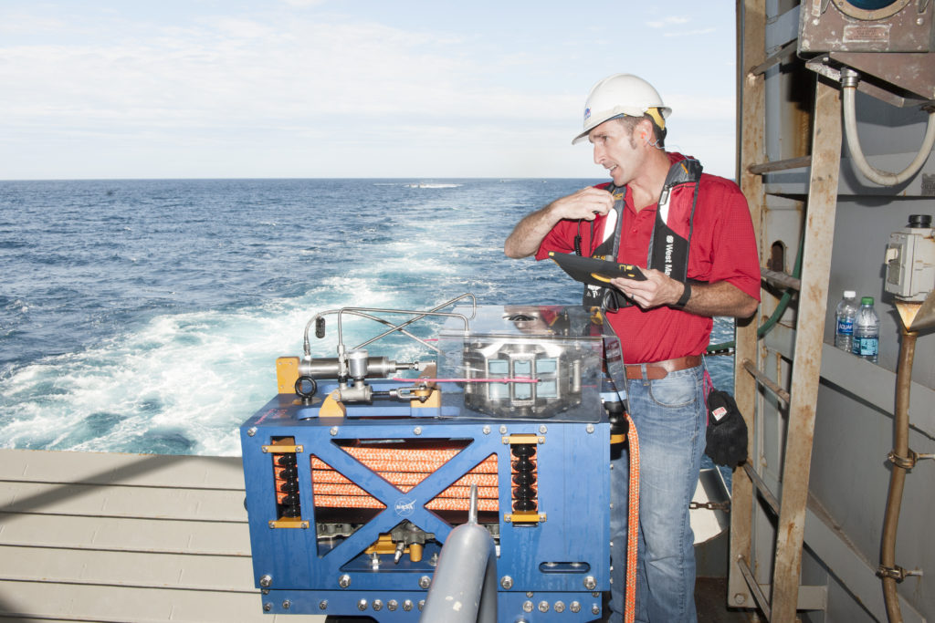 Jeremy Parr with the LLAMA during Orion Underway Recovery Test 5 in the Pacific Ocean.