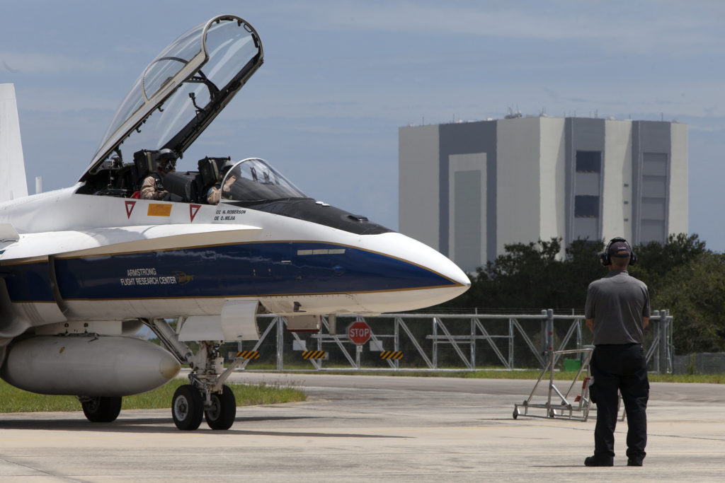 A NASA F-18 jet is prepared for takeoff from the agency's Shuttle Landing Facility at NASA's Kennedy Space Center in Florida. Several flights a day have been taking place the week of Aug. 21, 2017 to measure the effects of sonic booms. It is part of NASA's Sonic Booms in Atmospheric Turbulence, or SonicBAT II Program. 