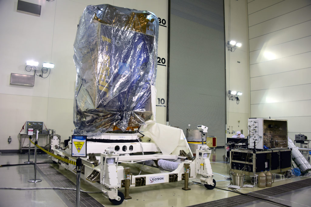 NOAA's Joint Polar Satellite System-1, or JPSS-1, remains wrapped in a protective covering after removal from its shipping container at the Astrotech Processing Facility at Vandenberg Air Force Base in California. The spacecraft is being prepared for its upcoming liftoff aboard a United Launch Alliance Delta II rocket from Vandenberg's Space Launch Complex-2W. JPSS-1 is the first in a series four next-generation environmental satellites in a collaborative program between NOAA and NASA.