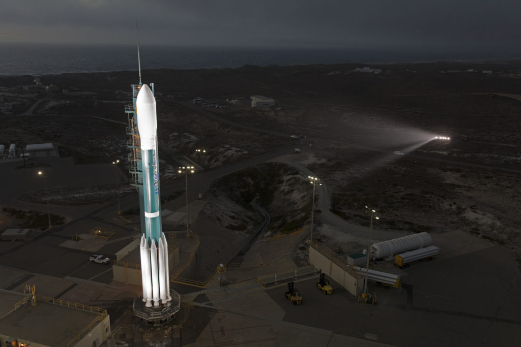 The tower rolls away from the Delta II rocket set to launch NOAA's JPSS-1 spacecraft.