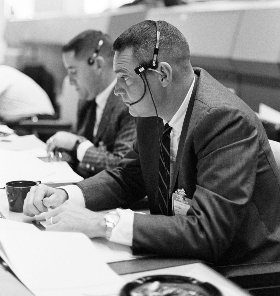 On March 23, 1965, NASA astronaut Clifton Williams monitors the Gemini III flight from the Mission Control Center in at the Manned Spacecraft Center (now Johnson Space Center).Houston. While Gemini III was controlled by the Mission Control Center at Cape Kennedy (now Cape Canaveral) Air Force Station, future missions would be controlled at the new space center in Texas.