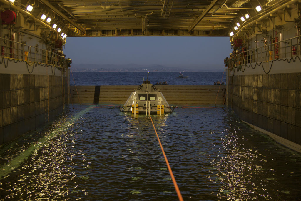 A test version of the Orion capsule is in the well deck of the USS Anchorage during Underway Recovery Test 6.