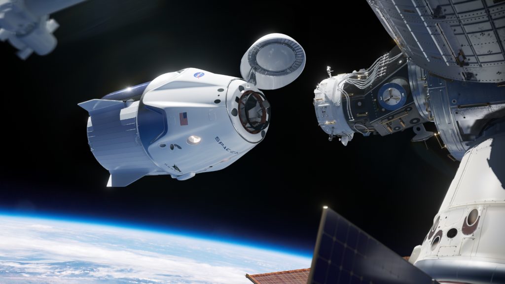 Artist illustration of SpaceX Crew Dragon docking to the International Space Station.