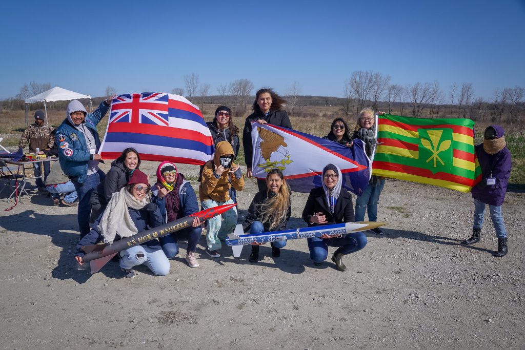 Students show off their rockets at the 10th annual First Nations Launch on April 26, 2019.