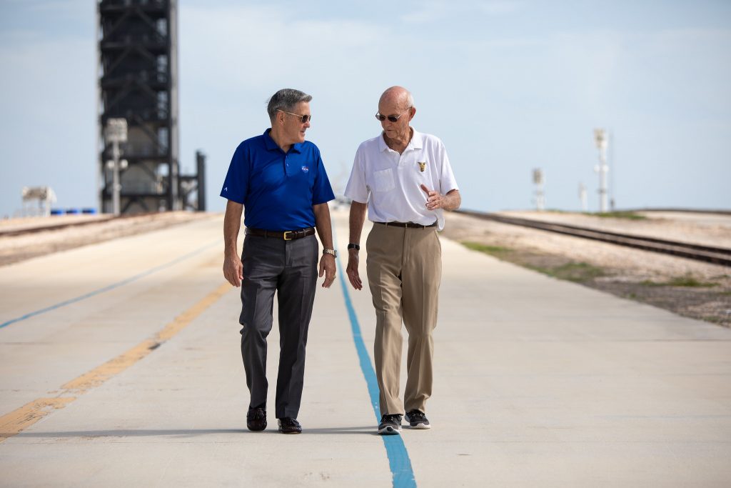 Kennedy Space Center Director Bob Cabana talks with Apollo 11 astronaut Michael Collins during his visit to Launch Complex 39A, site of the launch of the Apollo 11 launch to the Moon.