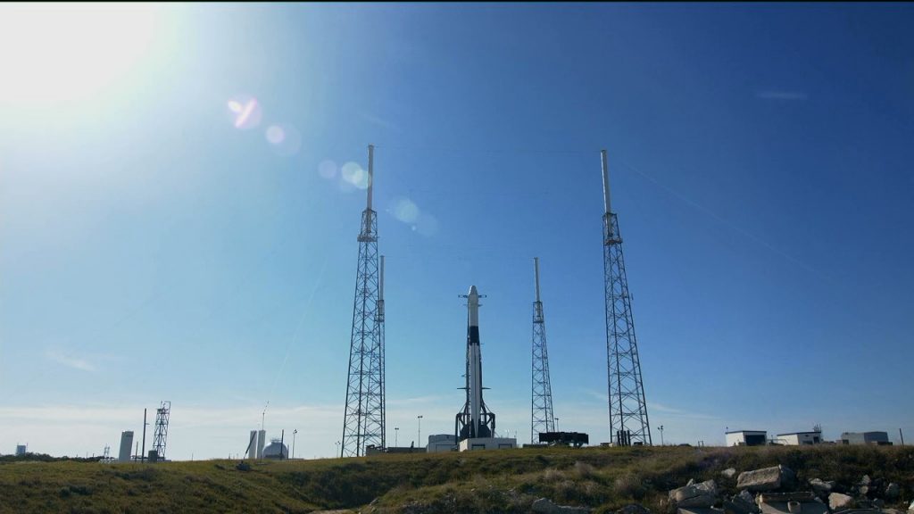 SpaceX Falcon 9 rocket and Dragon spacecraft await launch from Space Launch Complex 40.