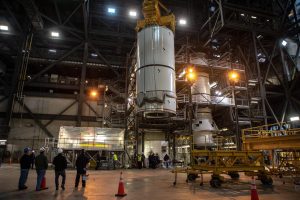 Teams from NASA’s Exploration Ground Systems and Space Launch System (SLS) practice SLS booster stacking with pathfinders inside Kennedy Space Center’s Vehicle Assembly Building on Nov. 19, 2019. 