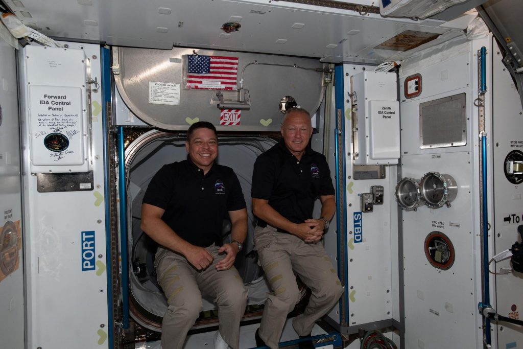 NASA astronauts Bob Behnken, left, and Doug Hurley, are pictured having just entered the International Space Station on May 31, 2020, shortly after arriving aboard the SpaceX Crew Dragon spacecraft.