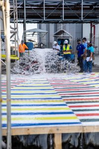 Water flows through large nozzles during rainbird testing for the Artemis II mission.