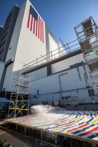 Water flows through a nozzle during rainbird testing for the Artemis II mission.