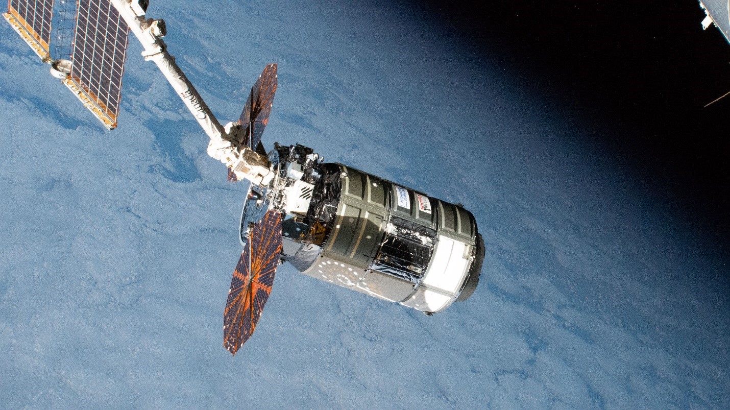 The Cygnus space freighter from Northrop Grumman is pictured moments after its capture with the Canadarm2 robotic arm. 