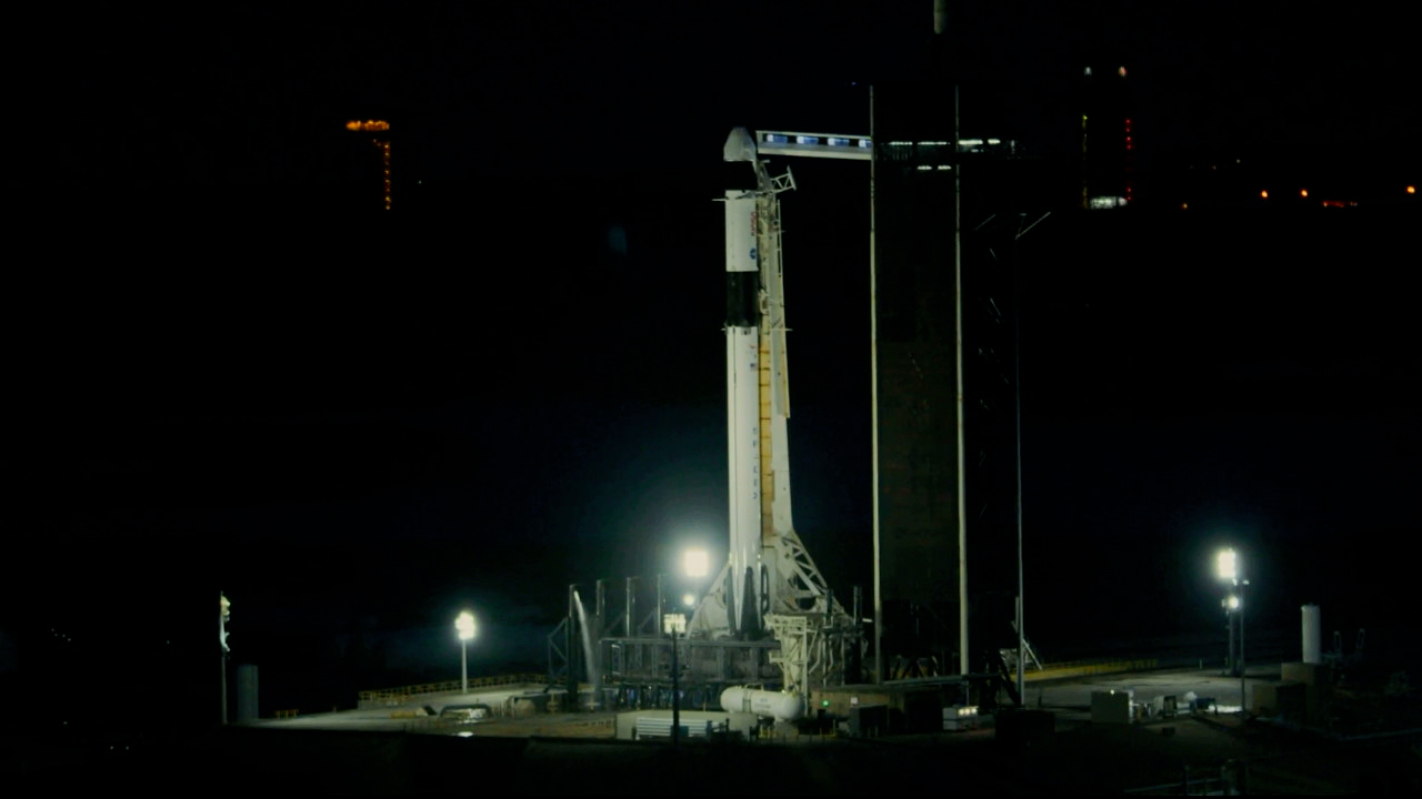 A SpaceX Falcon 9 rocket with the company’s Dragon spacecraft on top is seen on the launch pad at Launch Complex 39A at Kennedy Space Center. 