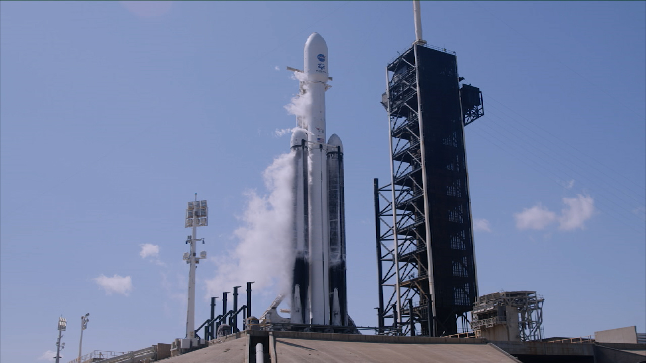 NASA’s Europa Clipper spacecraft and SpaceX’s Falcon Heavy rocket stands at Launch Pad 39A on Monday, Oct. 14, 2024, at the agency’s Kennedy Space Center in Florida ahead of launch to Jupiter’s icy moon, Europa.