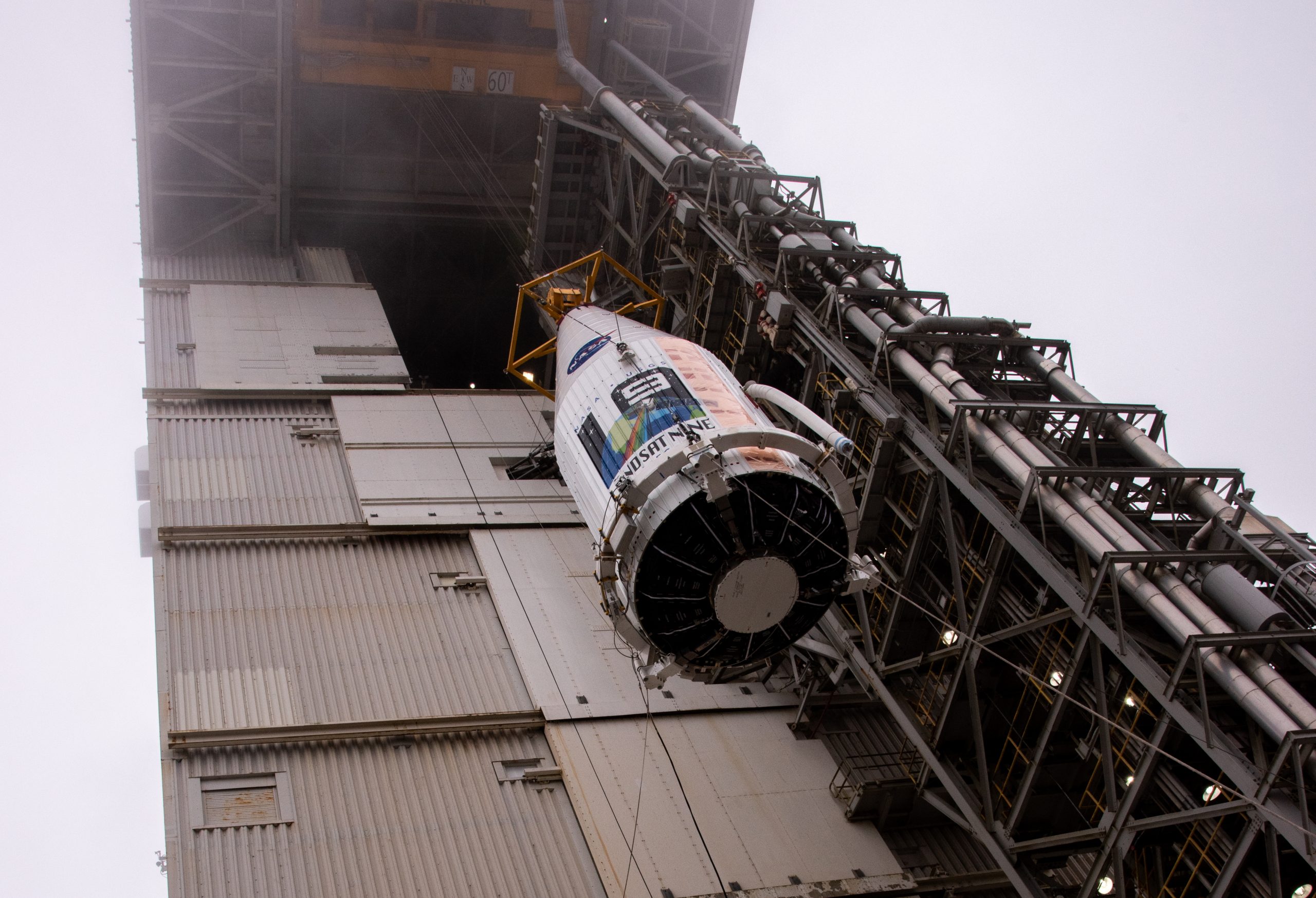 Landsat 9 spacecraft lift and mate operations take place.