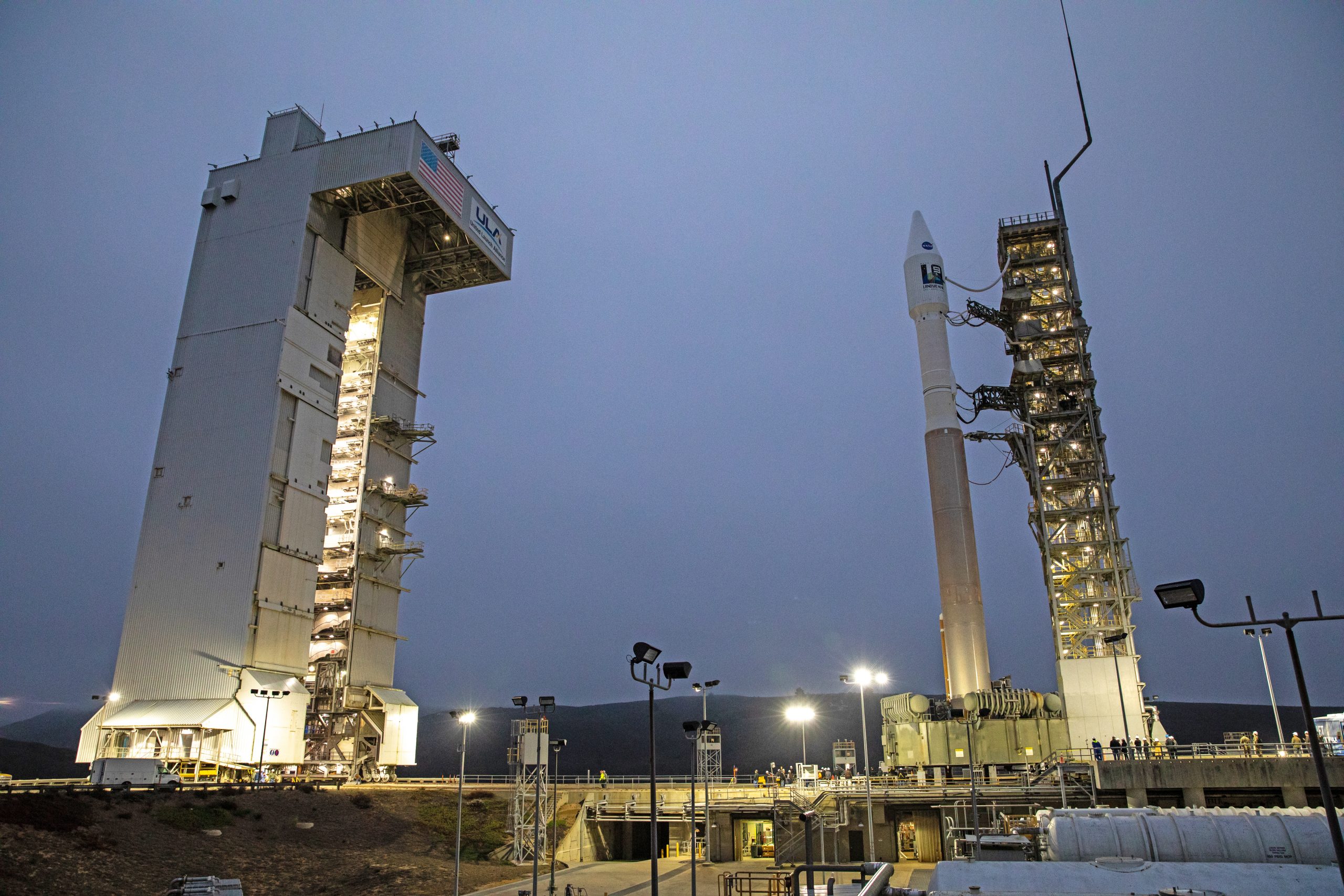 The United Launch Alliance Atlas V 401 rocket with NASA’s Landsat 9 satellite arrives at the launch pad at Space Launch Complex 3 (SLC-3) at Vandenberg Space Force Base in California, on Sept. 27, 2021, after rolling out from the Vertical Integration Facility. 