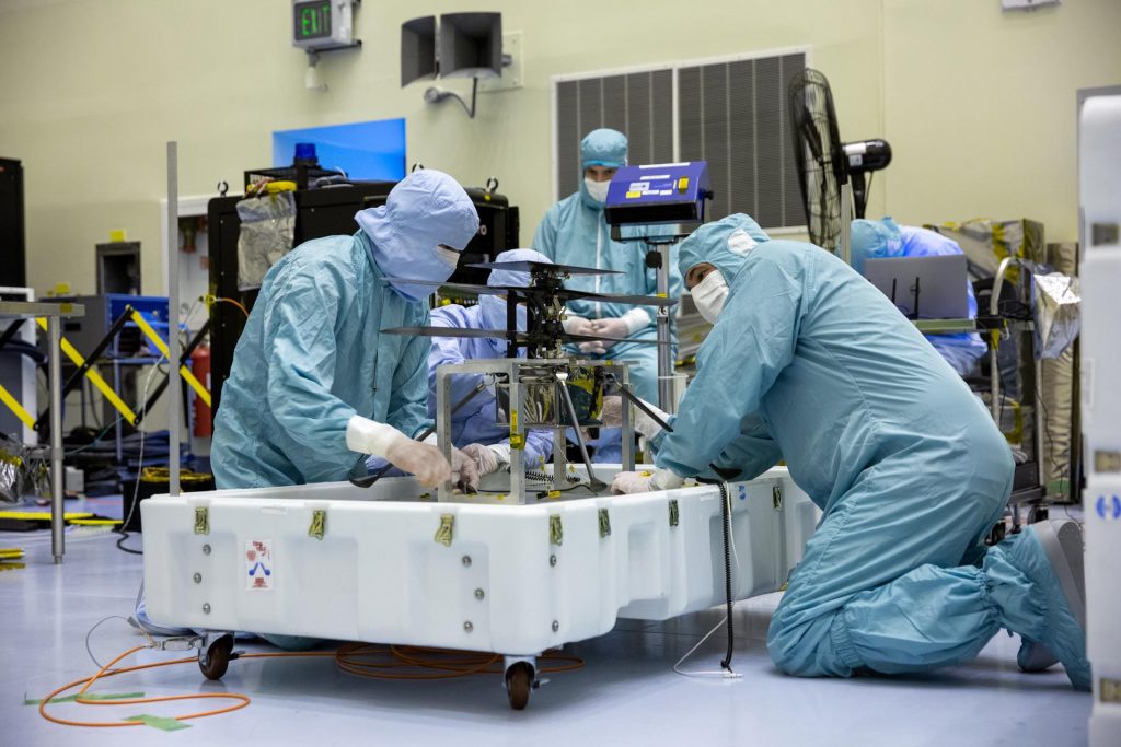 NASA’s Mars Helicopter and its cruise stage undergo functional testing in the airlock inside Kennedy Space Center’s Payload Hazardous Servicing Facility on March 10, 2020.