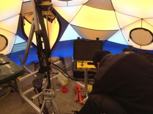 Alex Wong from Honeybee Robotics sets up the Icebreaker-2 drill inside a dome tent on Drill Hill.