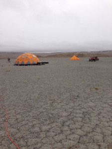 The Icebreaker team's drill test camp, set up in August 2013 at "Drill Hill", a massive impact breccia deposit within Haughton Crater.