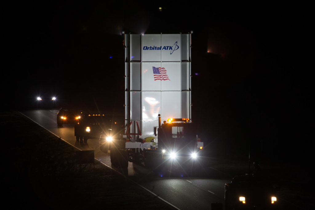 enclosed Cygnus spacecraft moved between buildings at NASA Wallops