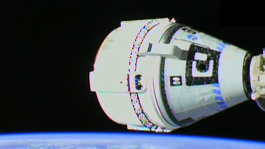 Boeing's Starliner crew ship is seen moments after docking to the International Space Station's forward port on the Harmony module. Credit: NASA TV