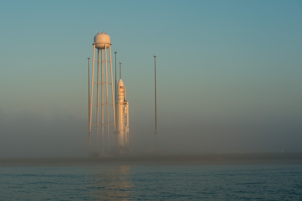 The Orbital Sciences Corporation Antares rocket, with the Cygnus spacecraft aboard, is seen during sunrise, Saturday, July 12, 2014. Credit: NASA/Bill Ingalls