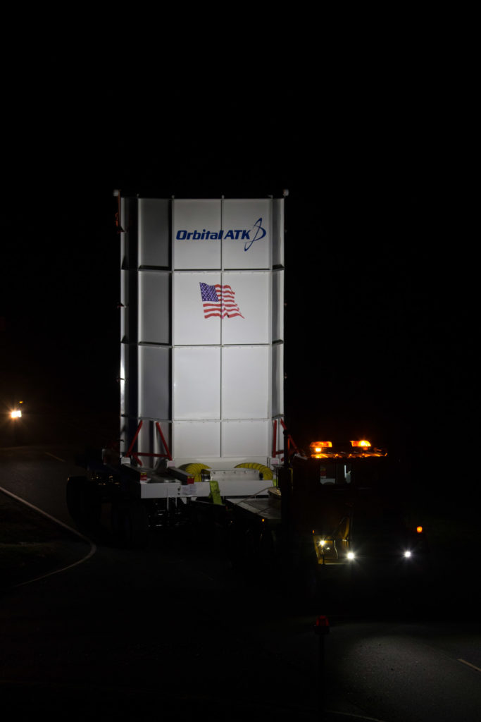 enclosed Cygnus spacecraft moved between buildings at NASA Wallops