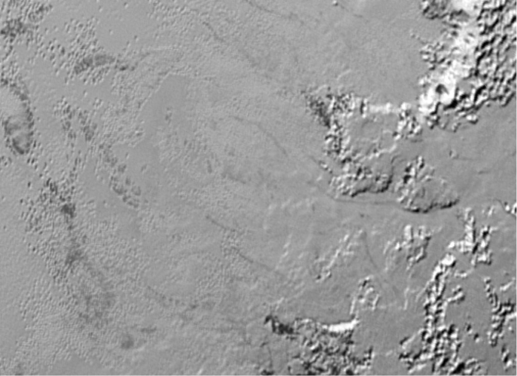 A nearly top-down view of Pluto’s icy plains